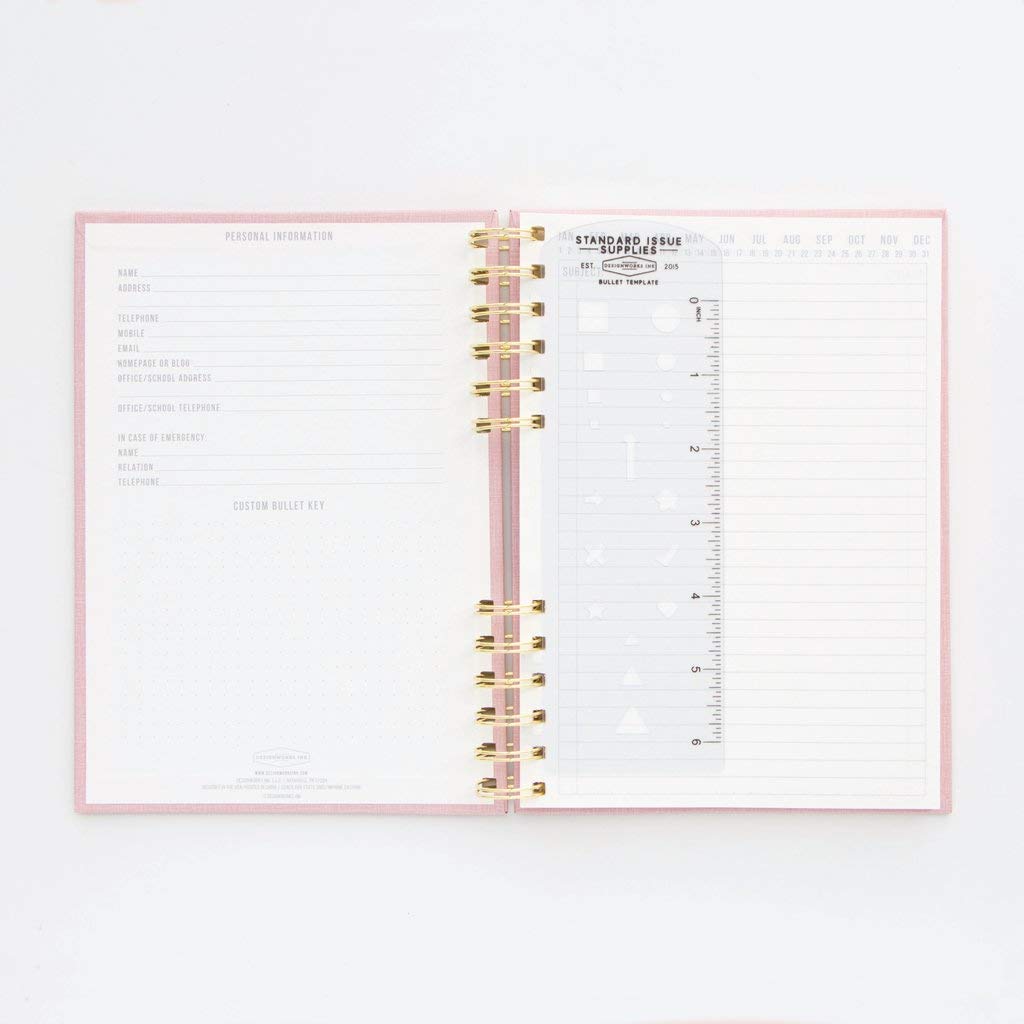 Designworks Ink Standard Issue No. 12 Dusty Pink Undated Planner Notebook Journal with Lined Pages, Elastic Pen Holder, and Durable Spiral Binding for Work, Writing, Journaling - 6" x 8.25"