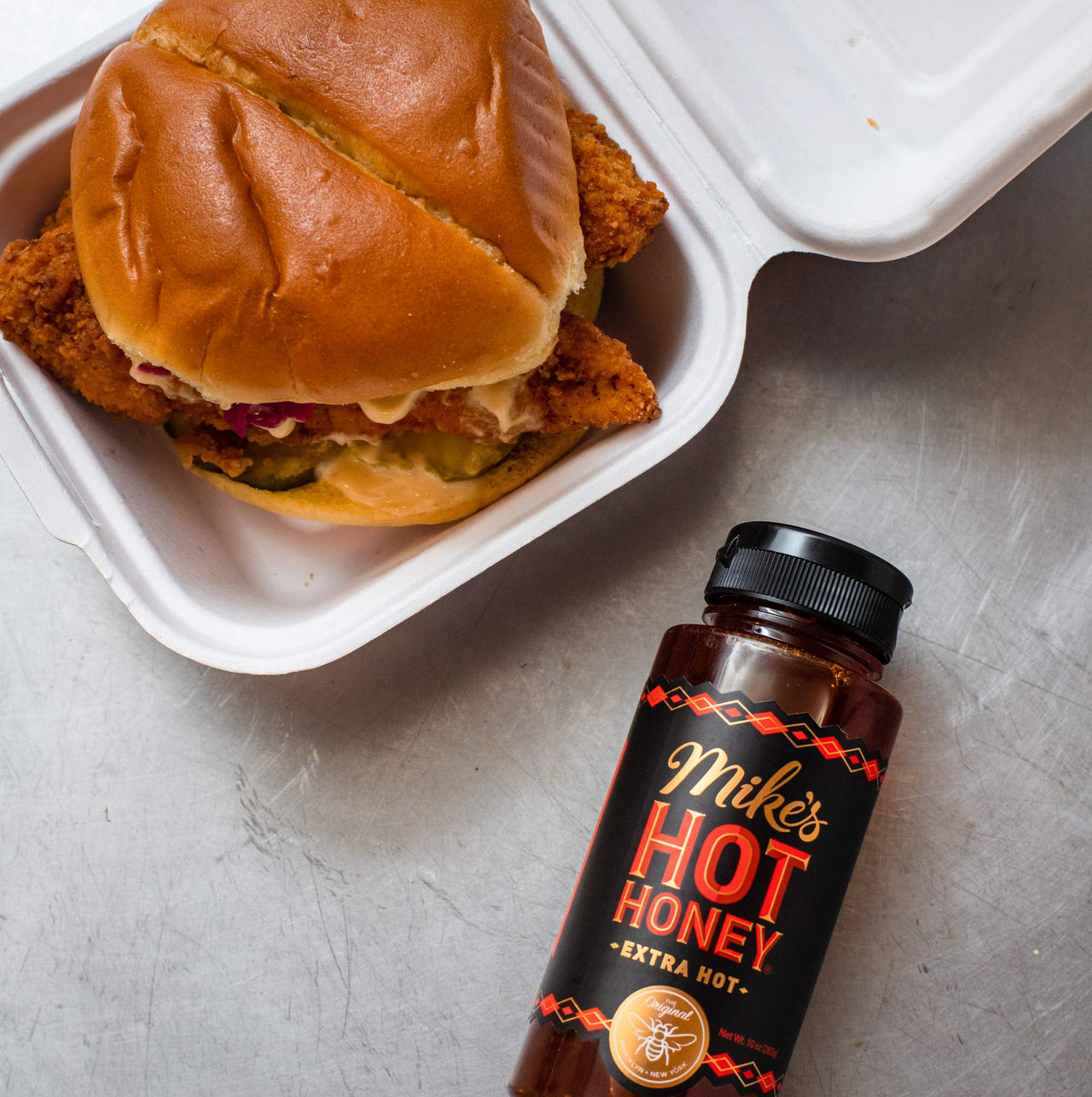 Mikes Hot Honey-Extra Hot, 10 oz Easy Pour Bottle (1 Pack), Hot Honey with an Extra Kick, Sweetness & Heat, 100% Pure Honey, Shelf-Stable, Gluten-Free & Paleo-Friendly, More than Sauce-it's  Hot Honey